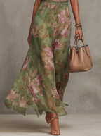 FIORI – Grønn maxikjole i chiffon med blomstertrykk og halterneck